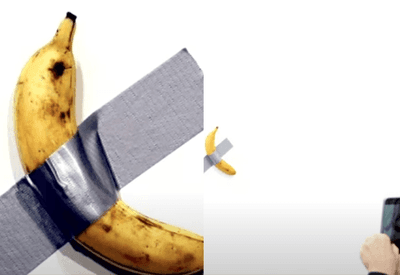 Visitante come banana de obra de arte avaliada em R$ 34 milhões